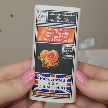 Milk Chocolate with Orange Peel and Blood Orange Oil